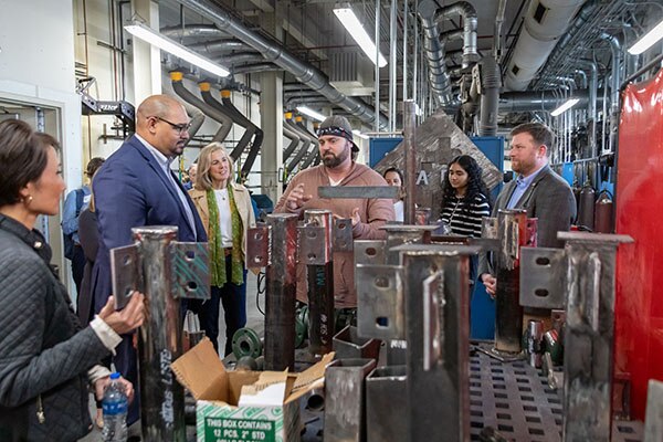 Leaders from Johnson Controls, the local community and HACC students and instructors tour the facility.