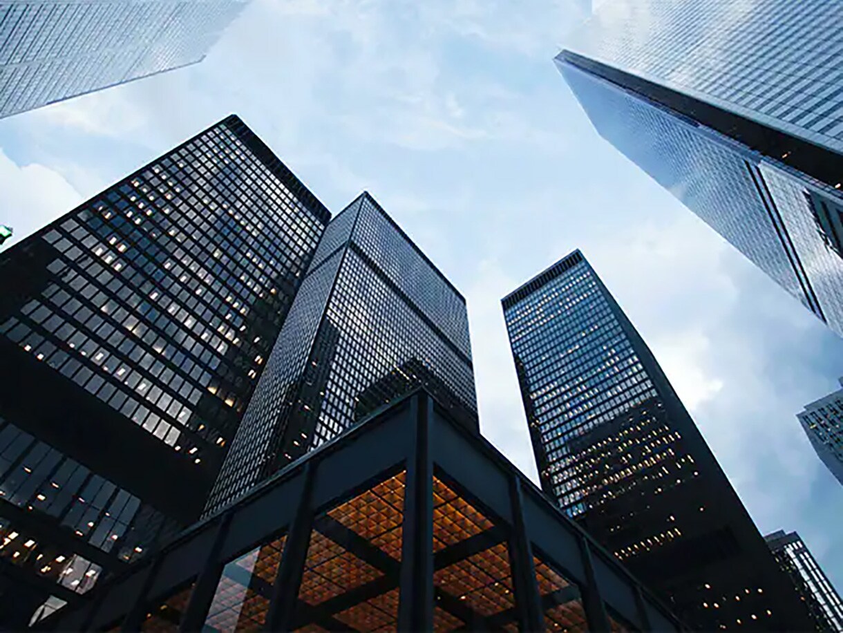 high rise buildings with glass windows