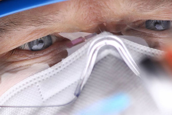 man with mask and eyewear