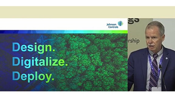 George Oliver speaking at the United Nations' Buildings Pavilion