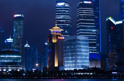 Cityscape at night across river