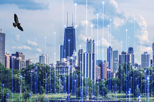 Modern cityscape overlaid with OpenBlue graphics, with an eagle flying overhead