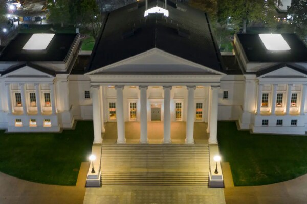 Aerial view of the Virginia State Capitol Building, lit up at night