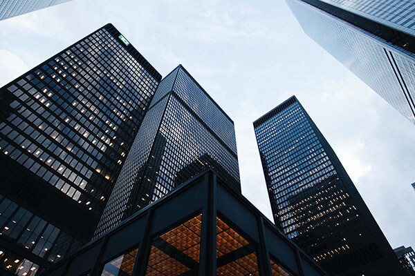 High-rise commercial buildings under the blue sky