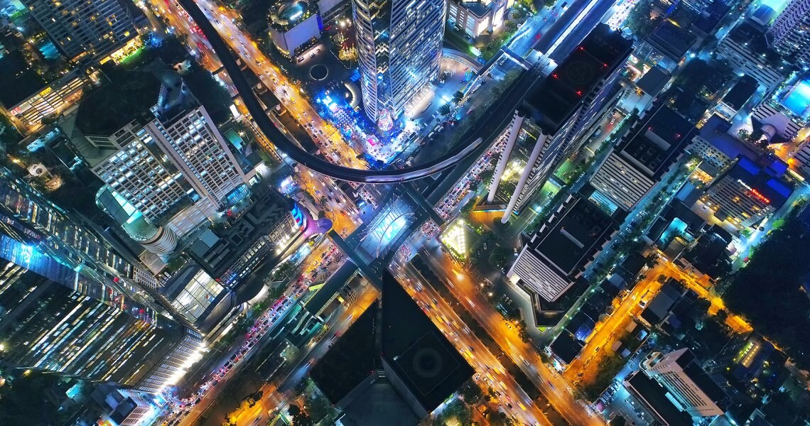 Aerial view of a busy metropolitan city at night