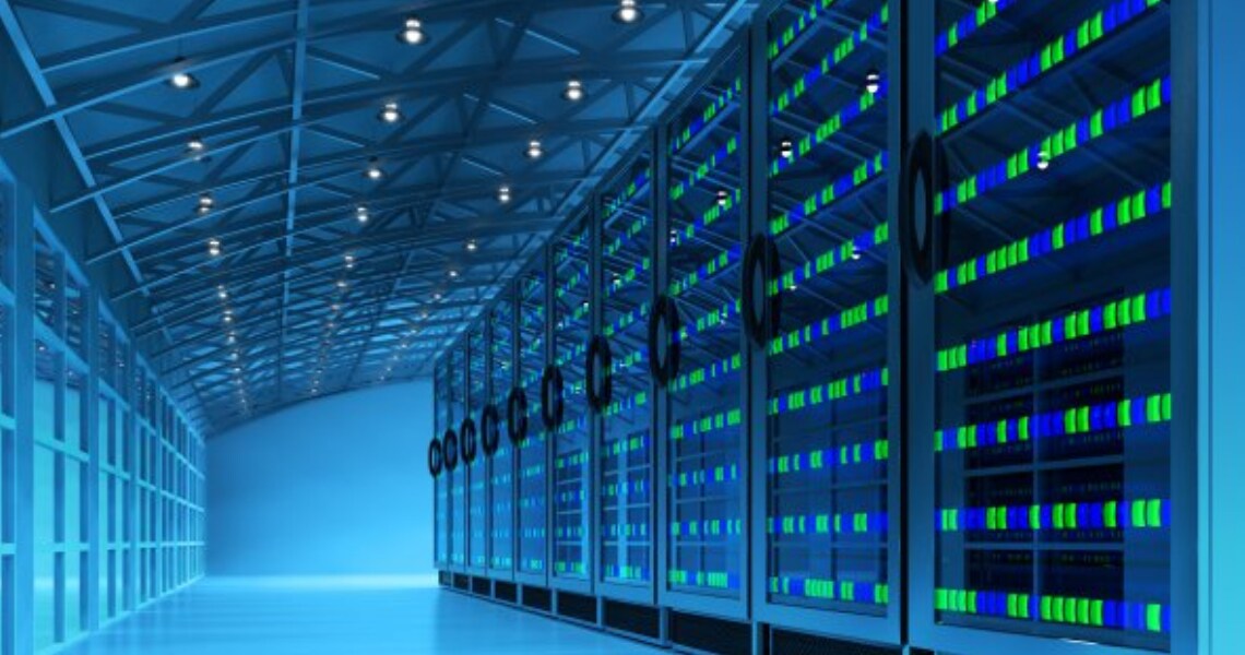 Interior of a data center with with racks and windows on either side