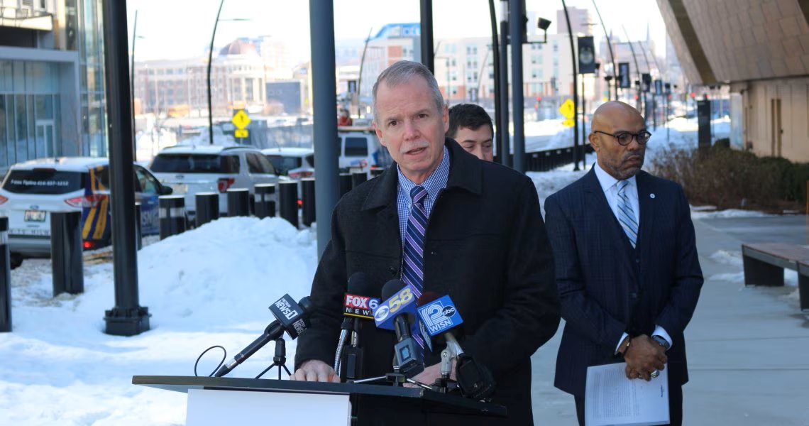George Oliver, CEO of Johnson Controls, addressing reporters at Fiserv Forum