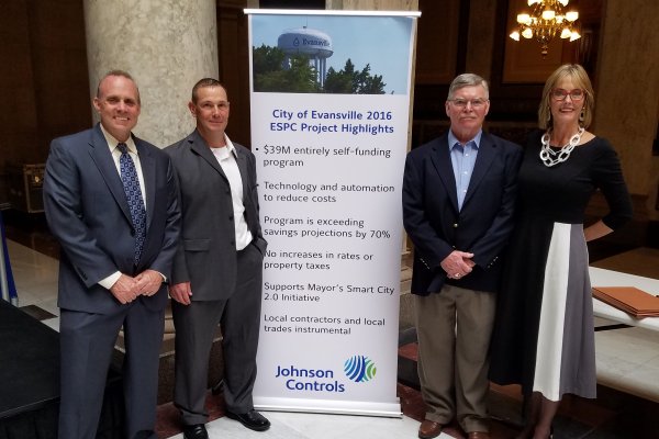Chris Downs, Daniel Claspell, Duane Gillis and Suzanne Crouch posing for the award for Outstanding Project of the Year from the Indiana Chapter of the Energy Services Coalition (ESC)