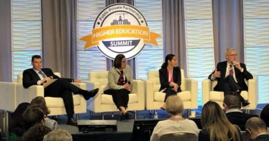 Panelists at a discussion at the P3 Higher Education Summit