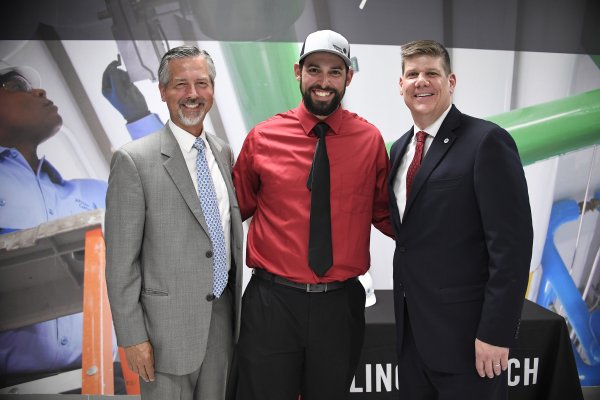 system technician executives posing for photoshoot 