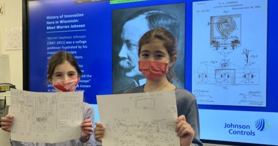 Students showing their smart bedroom designs