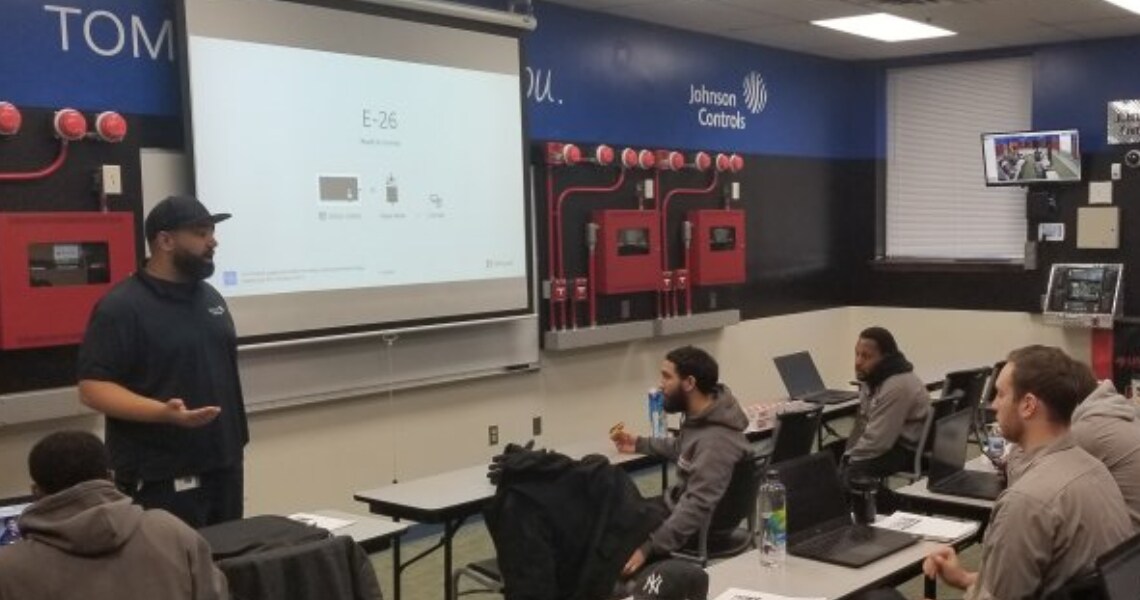 Students examining fire attending Tech and Teach Day in Lincoln Tech, hosted by Johnson Controls
