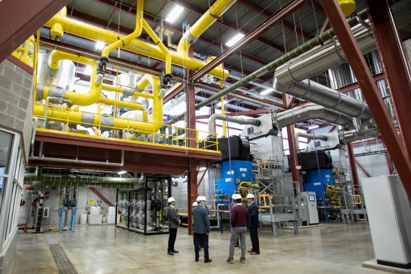 Maintenance workers in a thermochemical processing plant