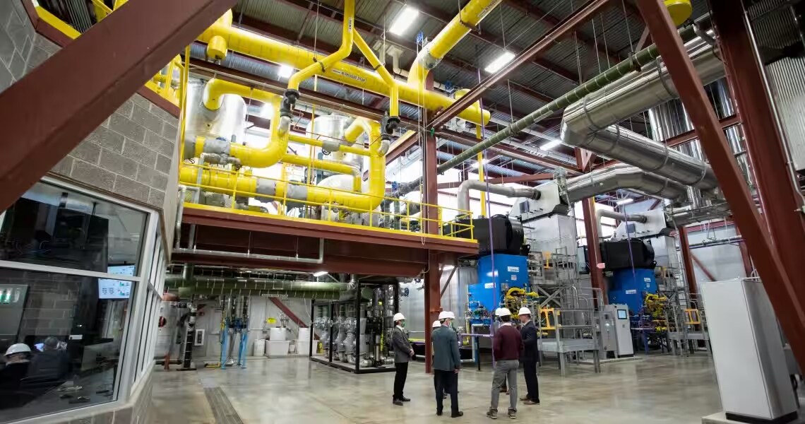 Maintenance workers in a thermochemical processing plant