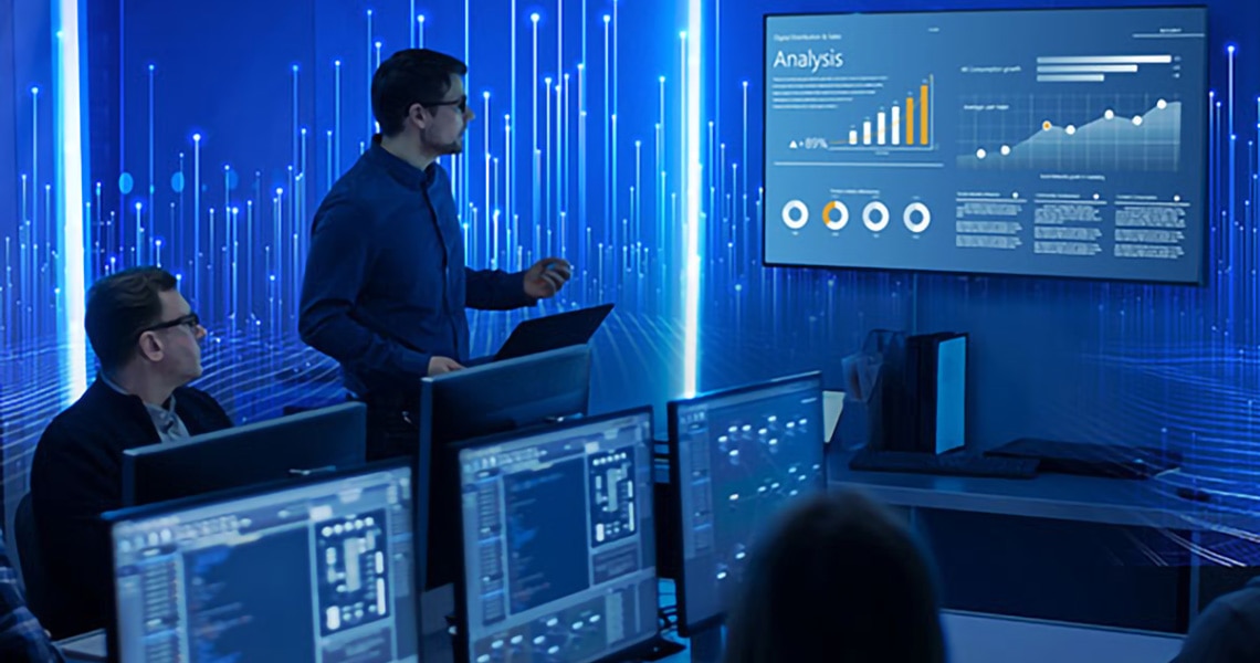 Man hosting a presentation in a conference room with modern graphics