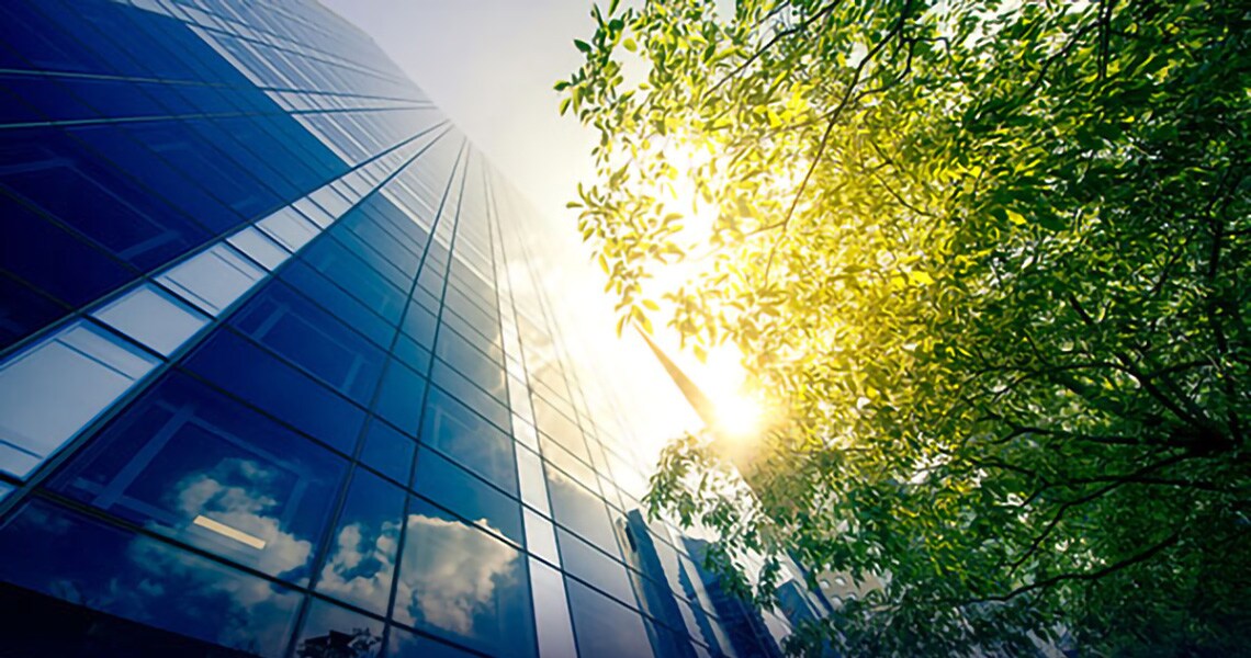 Frog's eye view of skyscrapers on a sunny day
