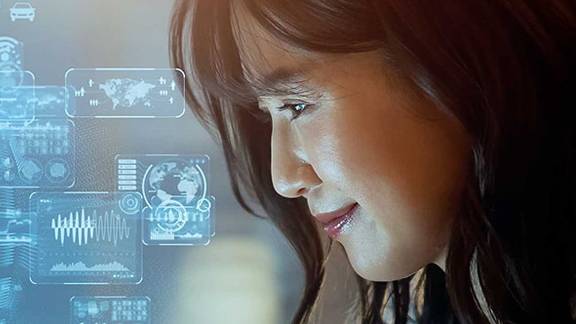 Close-up of a woman, overlaid with a graphic of various infographic