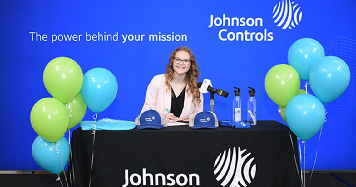 Rebecca Rentz, Finance and Accounting Intern, accepting a position in the Accounting & Finance Rotational Program on National Signing Day.