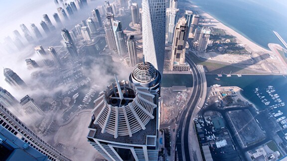 Aerial view of modern city skyline during evening