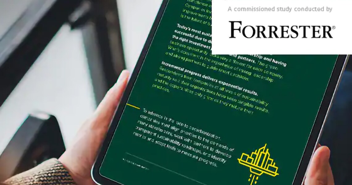 Close-up of a person reading a Forrester article on a tablet, with the Forrester logo overlaid on the top right
