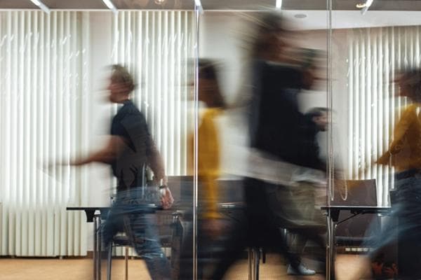 People walking on office