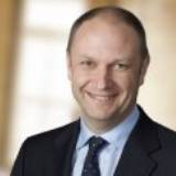 Headshot of John D. Young, Retired Group President, Chief Business Officer Pfizer Inc.