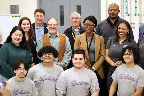 Leaders from Waukegan School District and Johnson Controls, along with students from Waukegan High School, celebrate the new HVAC lab