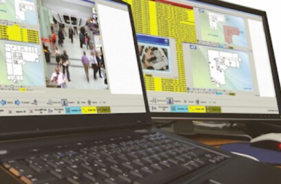 laptop and a computer next to each other, displaying information