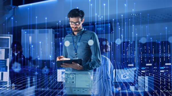 A man looking into the laptop