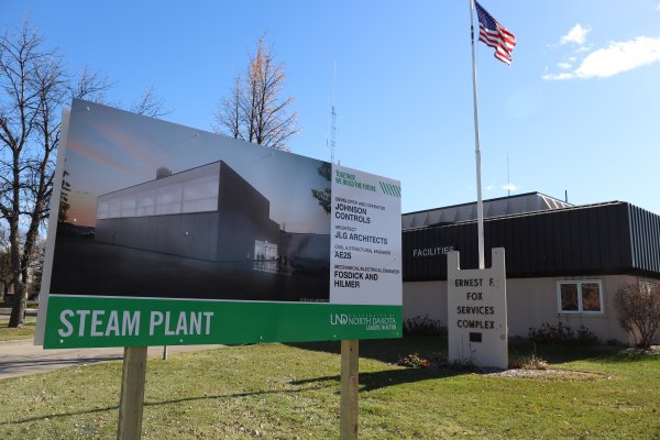 A board with information about a steam farm on the University of North Dakota campus