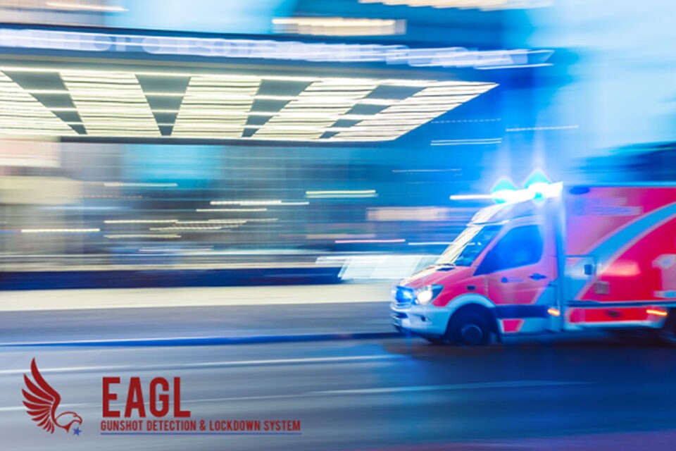 A red truck speeding across the road, with the EAGL logo in red at the bottom left corner