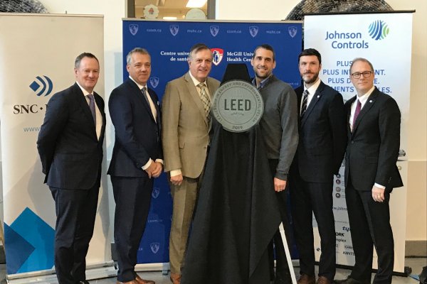 Stephane Couture, Regional Director, Johnson Controls with McGill University officials at their second LEED Gold certification