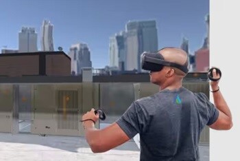Person wearing virtual-reality headgear, with a cityscape in the background
