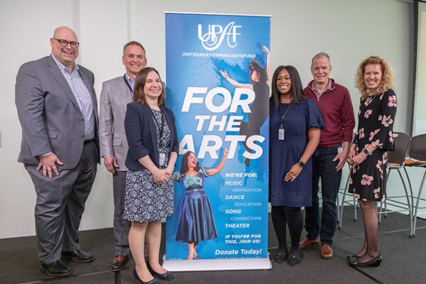 CEO George Oliver with the members of the Johnson Controls and United Performing Arts Fund teams