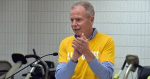 Johnson Controls CEO George Oliver speaking at a celebratory event