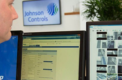 security officer watching surveillance footage