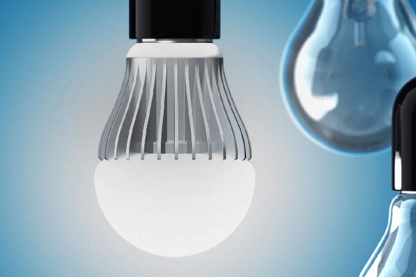 Five hanging lamps with one switched on