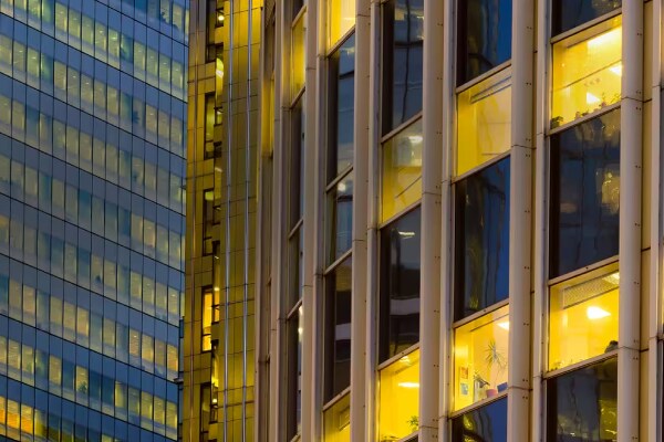 Close-up of the exteriors of two skyscrapers