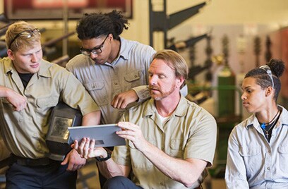 Four people in conversation