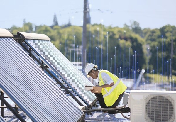 A technician working on the rooftop