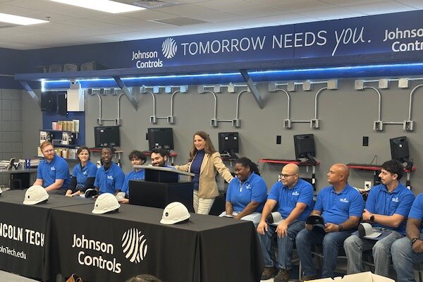 Alison Neuman (center), Johnson Controls workforce development program manager. 