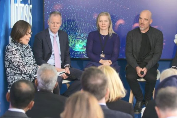 Business People in conference meeting sitting on stage