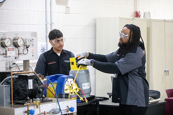 Students from Kennedy King Community College demonstrate learnings from class