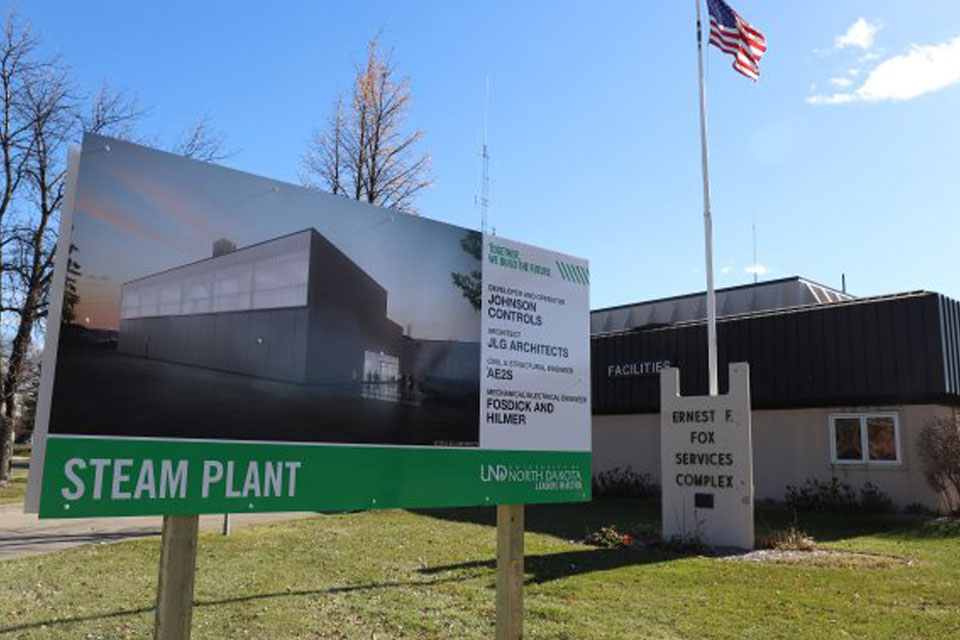 A board with information about a steam farm on the University of North Dakota campus