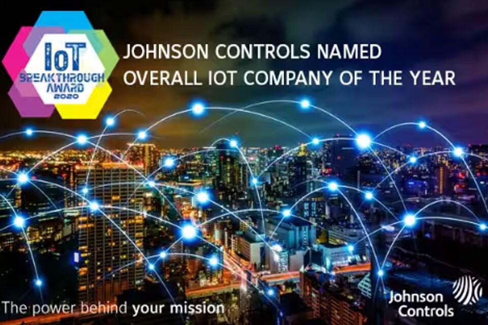 Cityscape at nighttime with modern graphics and the IoT Breakthrough Award 2020 logo