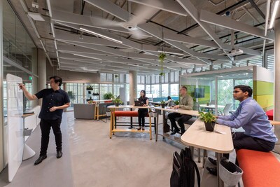 People attending a team meeting in the Johnson Controls digital innovation center in Singapore