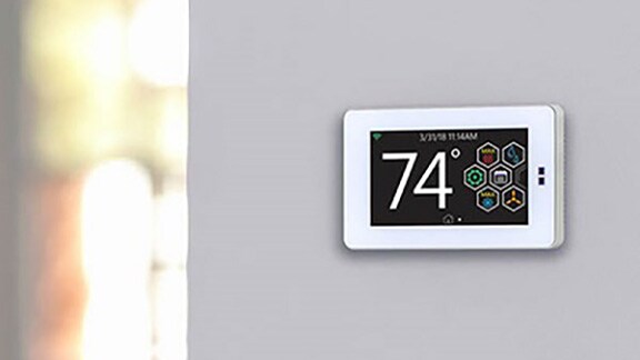 Thermostat on a white wall